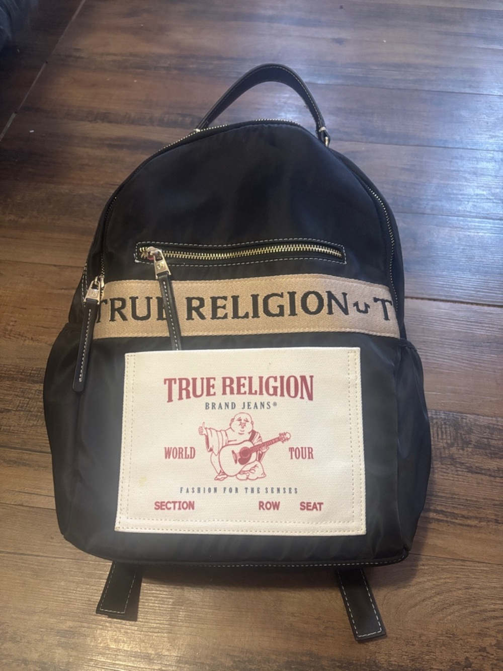 True Religion Black Backpack with Beige Band and White Front Patch